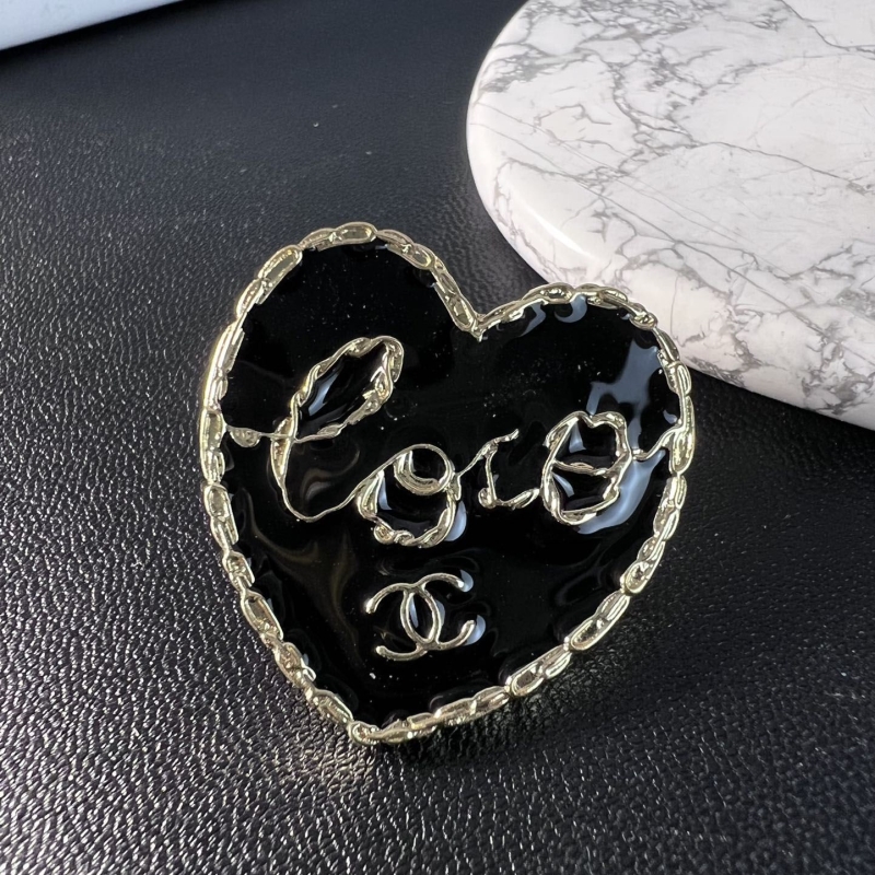 Ch*el brooches